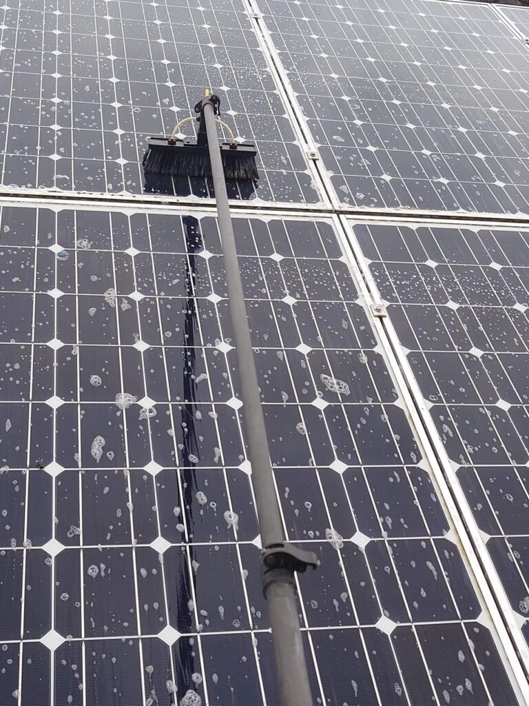 Water fed pole cleaning solar panels safely on roof in Lowestoft Suffolk